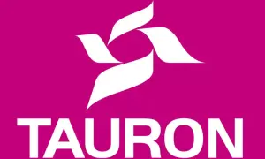 Logo Tauron na fuksjowym tle. Biały symbol przypomina ptaka lub płomień. Pod nim napis "TAURON". Idealne do wyboru taryfy g12w Tauron.
