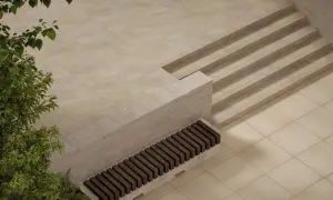 Nowe schody zewnętrzne obłożone jasnymi płytkami, idealne do nowoczesnej aranżacji.